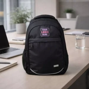 Atlas Classic Laptop Backpack 15.6 inch placed on office desk with office accessories for corporate gifting and employee welcome kits