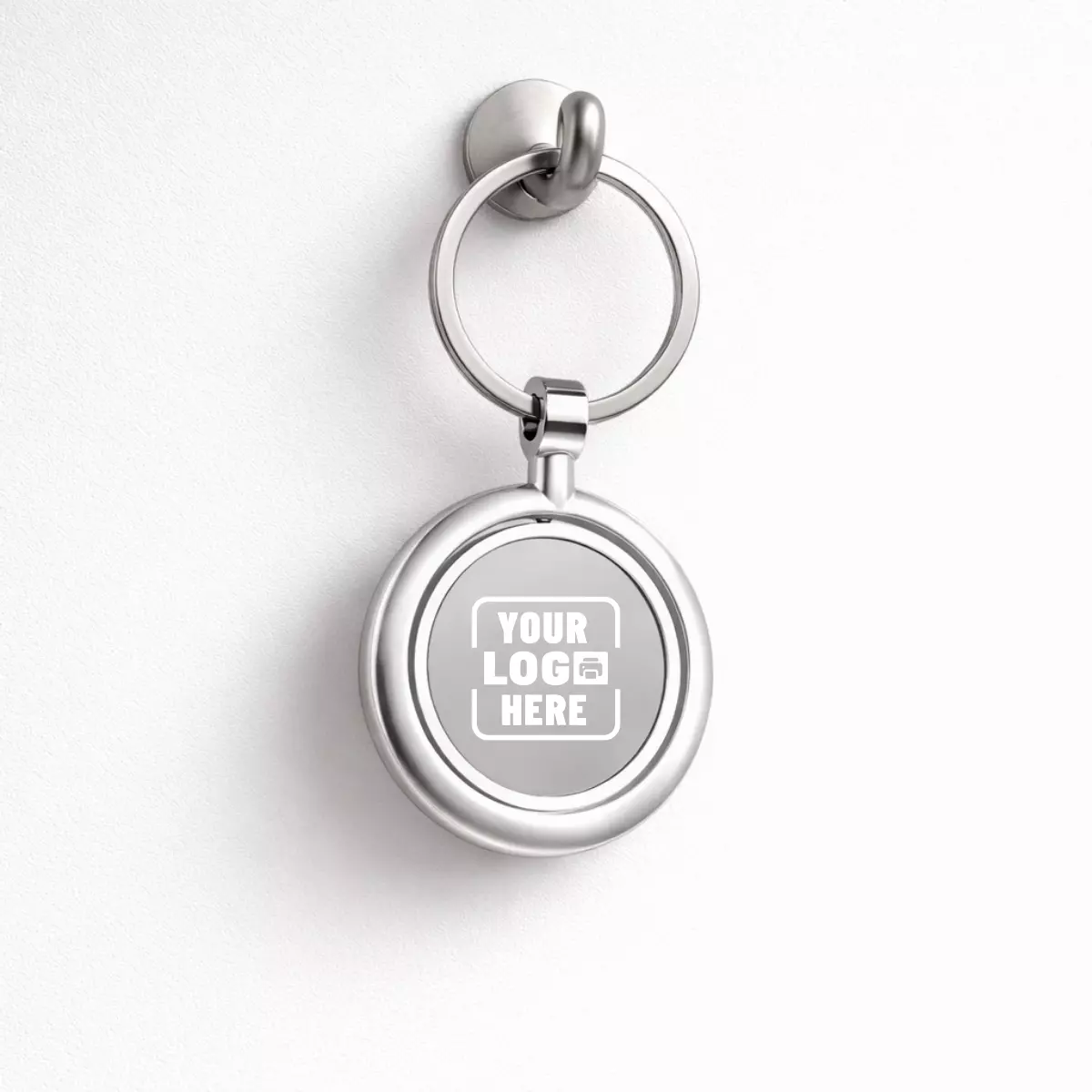 Silver metal rotating keychain suitable for corporate gifting and employee welcome kits