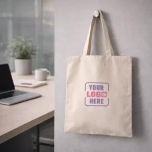 Classic cotton tote bag cream displayed hanging suitable for corporate gifting and employee welcome kits