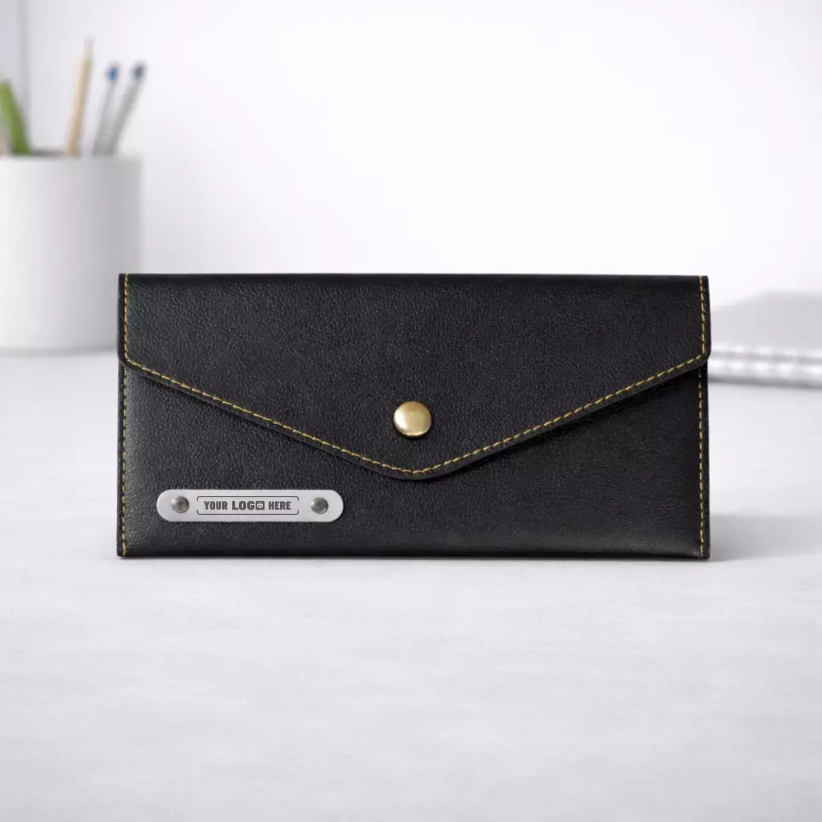 Black leather ladies clutch purse with multiple compartments suitable for corporate gifting and employee welcome kits