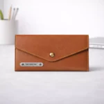 Tan leather ladies clutch purse with multiple compartments suitable for corporate gifting and employee welcome kits
