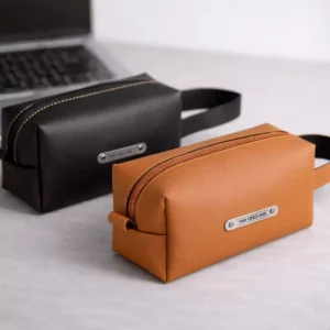 Executive leather utility pouch with zipper closure suitable for corporate gifting and employee welcome kits