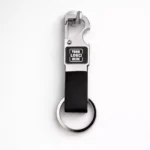 Classic metal hook leather keychain with premium finish suitable for corporate gifting and employee welcome kits