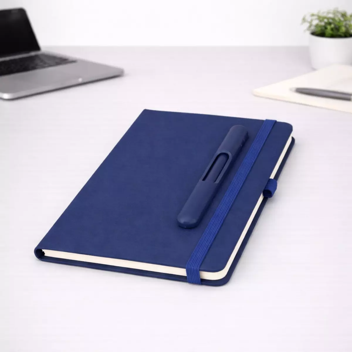 Blue PU fabric A5 diary closed with pen holder and 192 pages suitable for corporate gifting and employee welcome kits