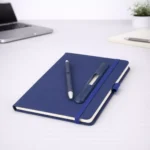 Blue PU fabric A5 diary with pen holder and 192 pages suitable for corporate gifting and employee welcome kits