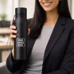 Signature steel bottle black 700 ml held in hand suitable for corporate gifting and employee welcome kits