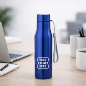 Signature steel bottle blue 700 ml placed on office desk suitable for corporate gifting and employee onboarding kits