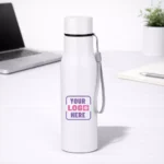 Signature steel bottle white 700 ml placed on office desk suitable for corporate gifting and employee welcome kits