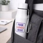 Signature steel bottle white 700 ml placed inside office bag suitable for corporate gifting and employee onboarding kits