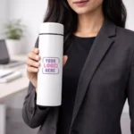 Smart sensor bottle white 500 ml held in hand suitable for corporate gifting and employee onboarding kits