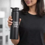 Sporty steel water bottle black 750 ml held in hand suitable for corporate gifting and employee onboarding kits