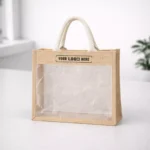 Jute bag with transparent window panel and sturdy handles suitable for corporate gifting and packaging