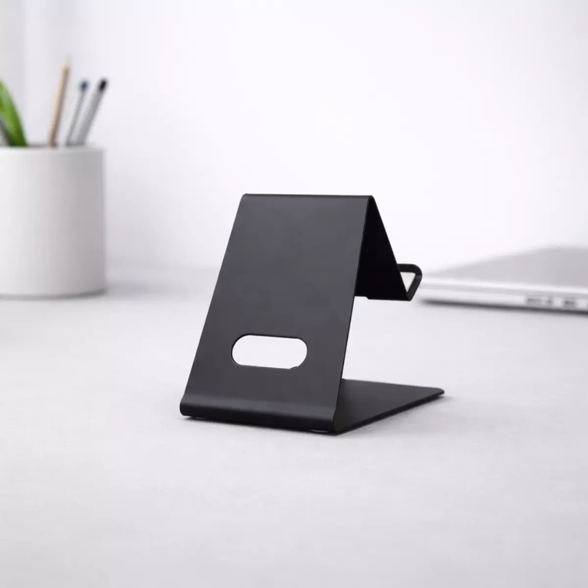 Black metal mobile stand with sturdy base suitable for corporate gifting and employee desk setups