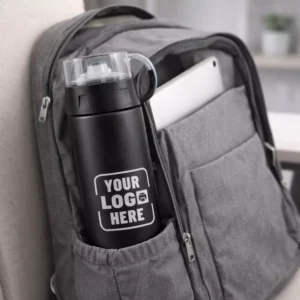 Vacuum insulated bottle 500 ml with cup lid placed inside office bag suitable for corporate gifting and employee welcome kits