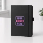 diary black colored kept on table