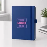 diary blue colored kept on table