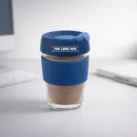 TintBox Glass Coffee Sipper Cup 350ml blue with clear durable design for beverages in corporate gifting and onboarding kits by Brandvaarta