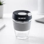 TintBox Glass Coffee Sipper Cup 350ml with clear borosilicate design for beverages in corporate gifting and onboarding kits by Brandvaarta