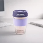 TintBox Glass Coffee Sipper Cup 350ml purple with durable borosilicate design for beverages in corporate gifting and onboarding kits by Brandvaarta