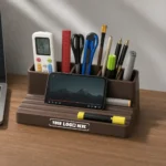 GrooveMate desk organiser in brown finish with storage compartments for office essentials and employee welcome kits