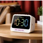 Prism Bluetooth clock speaker with digital LED display for office desks, employee welcome kits, and corporate gifting in India